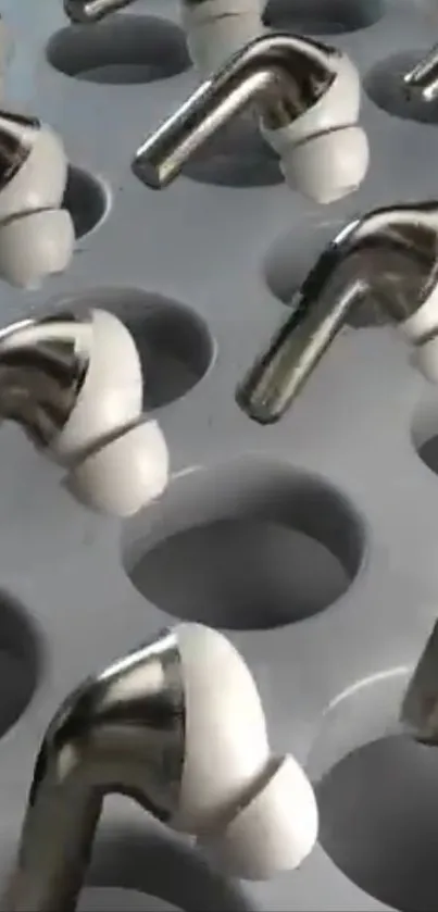 Modern earbuds arranged in a display tray.