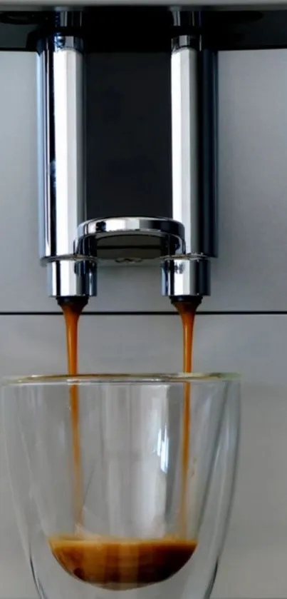 Espresso machine pouring coffee into glass.