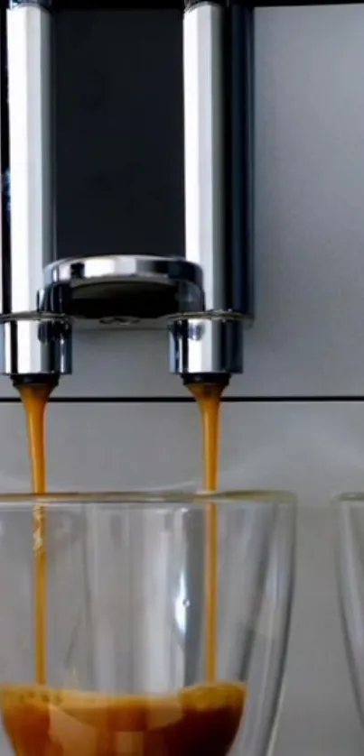 Close-up of a modern espresso machine pouring coffee into glasses.