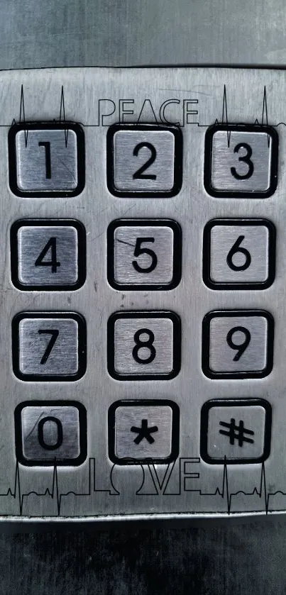 Metallic numeric keypad with peace and love engravings.