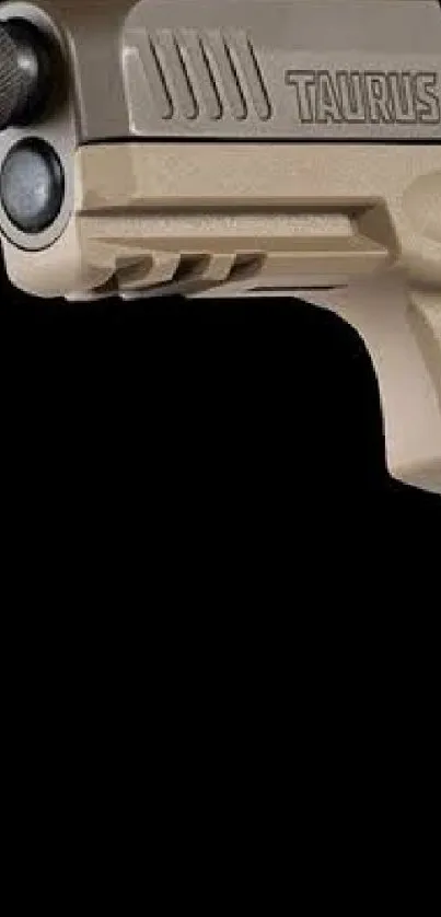 Beige pistol on black background wallpaper.