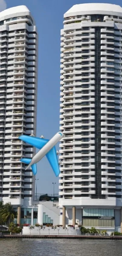 Twin skyscrapers with a plane flying past against a clear blue sky.