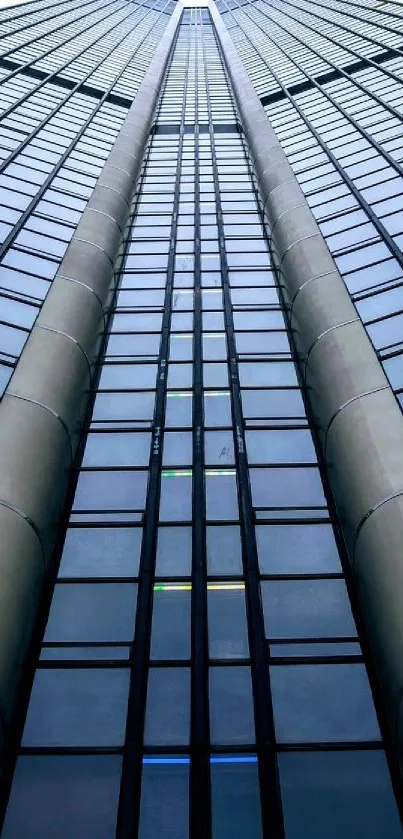 Modern skyscraper wallpaper with blue glass facade.