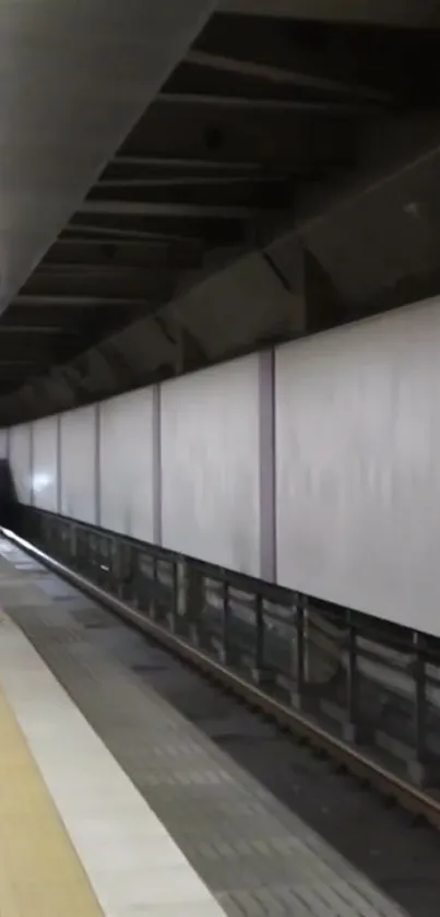 Modern subway station with a train arriving on the platform.