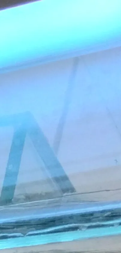 Modern tech setup with blue lighting and glass elements.