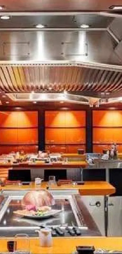 Modern teppanyaki restaurant with orange decor and sleek design.