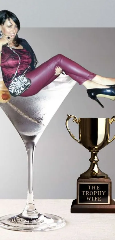 Trophy wife in a martini glass with a trophy by her side in a stylish wallpaper.