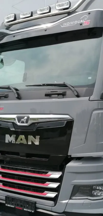 Front view of a modern grey truck, ideal for mobile wallpaper.