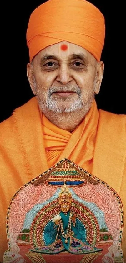 Portrait of a monk in an orange robe holding an intricate artifact on a black background.