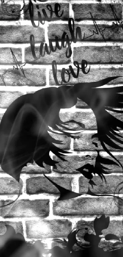Black and white wallpaper with 'Live Laugh Love' on a brick wall.