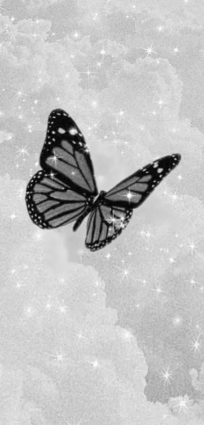 Grayscale butterfly flying over stars and clouds on mobile wallpaper.
