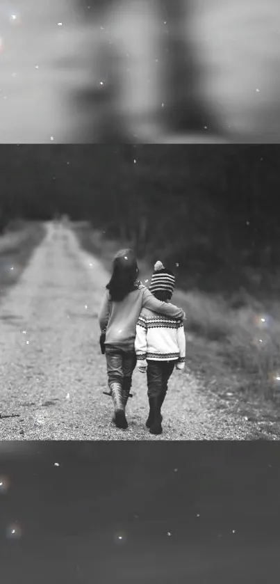 Black and white image of two kids walking on a path, evoking nostalgia and friendship.