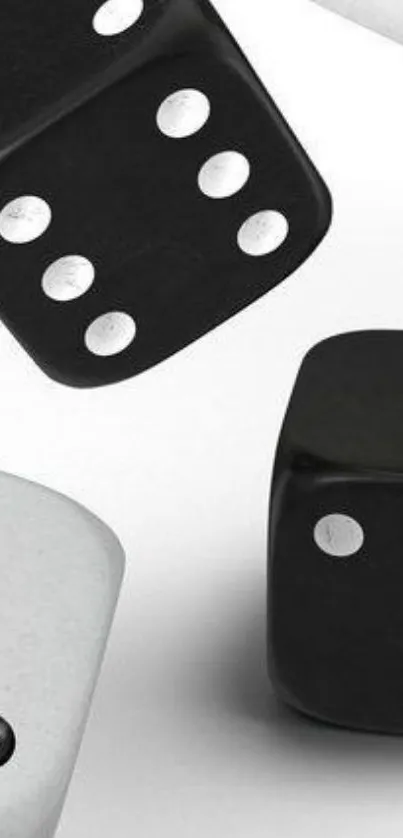 Black and white dice wallpaper with minimalist design and contrasting colors.