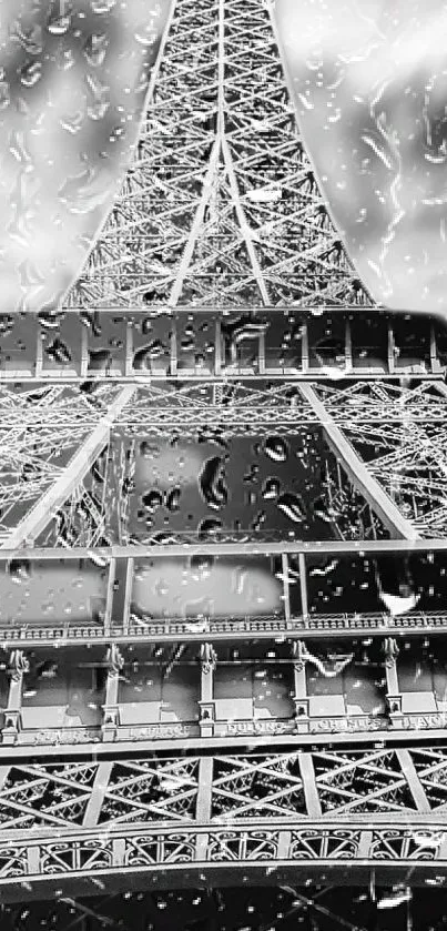 Monochrome wallpaper of Eiffel Tower with rain drops in black and white.