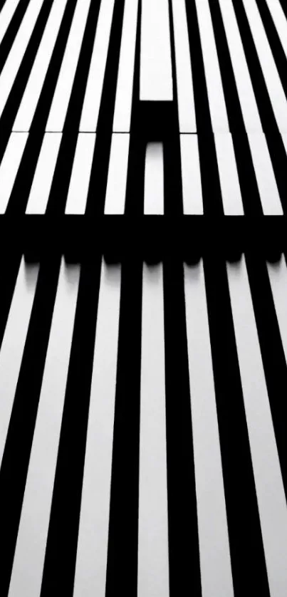 Monochrome geometric wallpaper with bold black lines creating optical patterns.