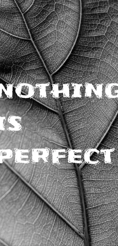 Monochrome leaf wallpaper with 'Nothing is Perfect' quote.