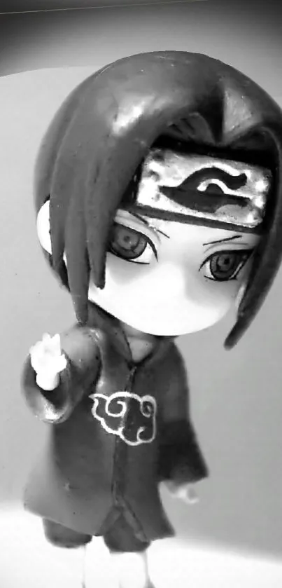 Monochrome anime ninja figure in grayscale.