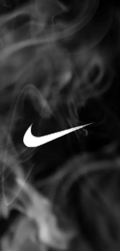 Monochrome wallpaper with smoke and a white swoosh logo on a dark background.