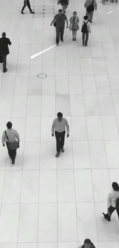 Monochrome urban scene with walking people on a tiled floor.