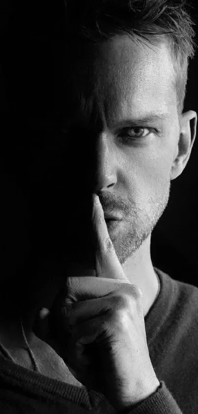 Mysterious black and white portrait wallpaper with deep shadows.