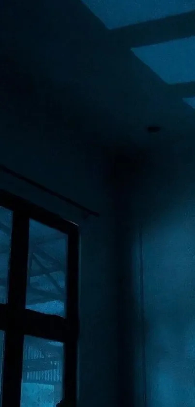 Moody blue-lit room with dark shadows and window.