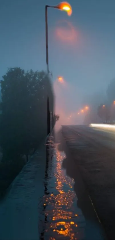 Foggy night street scene with glowing streetlights and reflections.