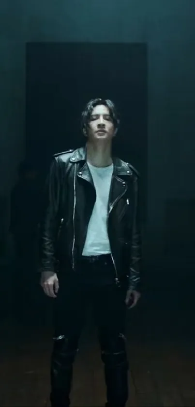 Person in black leather jacket, moody lighting.