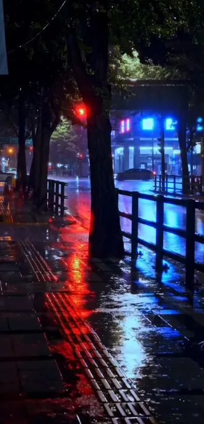 Moody night street with neon light reflections and wet pavement.