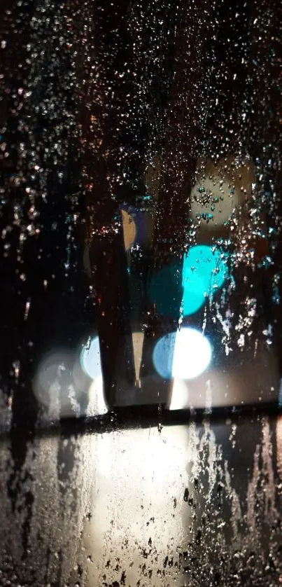 Raindrops on glass with night lights in the background.