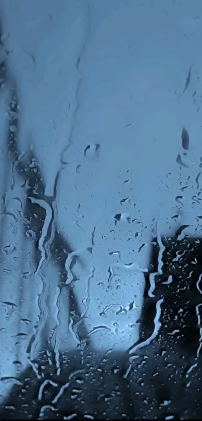 Moody raindrop wallpaper with blue hues.