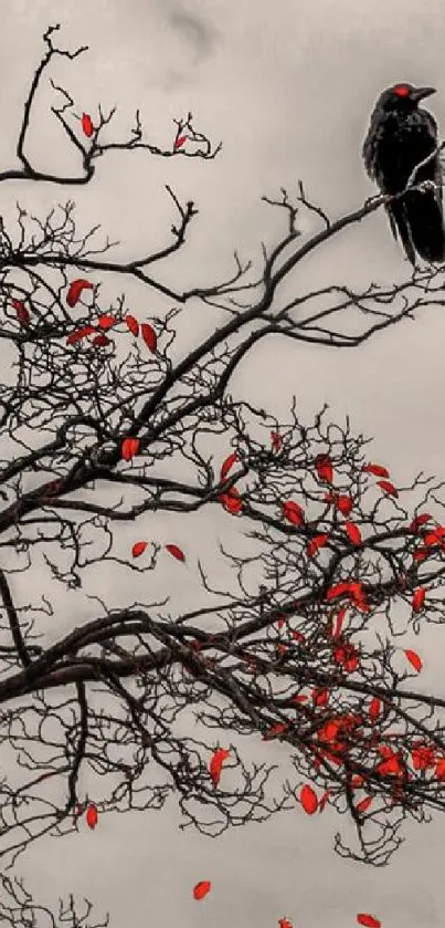 A lone tree with vivid red leaves on a gray background.