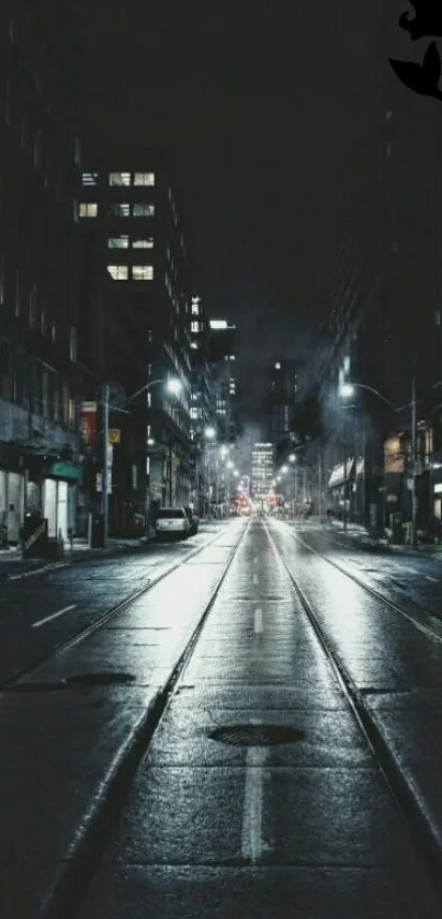 Moody city street at night with glowing lights and wet pavement.