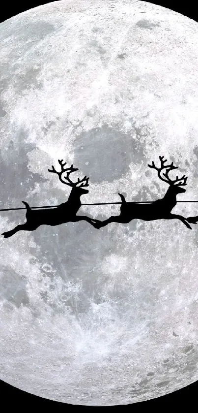 Silhouette of Santa's sleigh against a bright full moon.