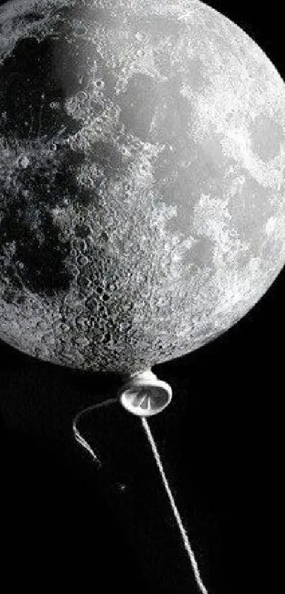 Artistic moon balloon floats against a black night sky in this unique wallpaper design.