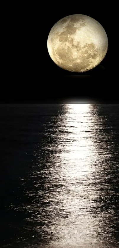 Full moon reflecting on dark water at night, creating a serene and tranquil scene.