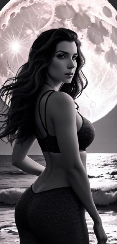 Grayscale scene of a woman on a moonlit beach with a large full moon.