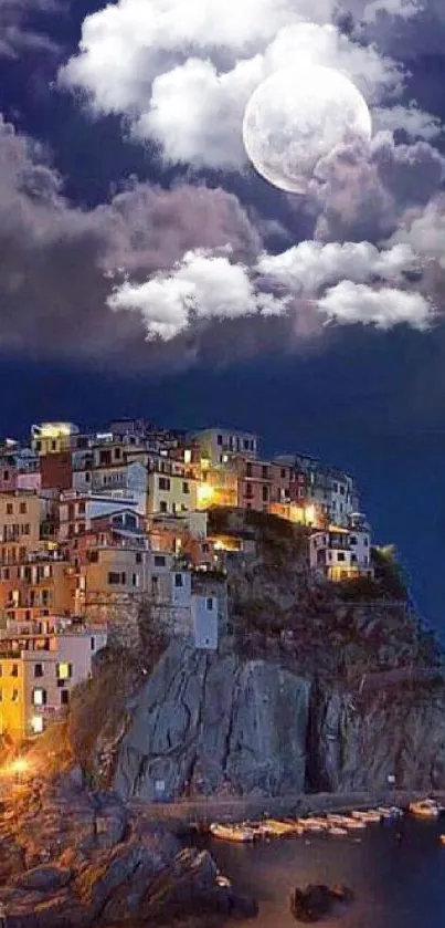 Moonlit coastal village with full moon over sea.