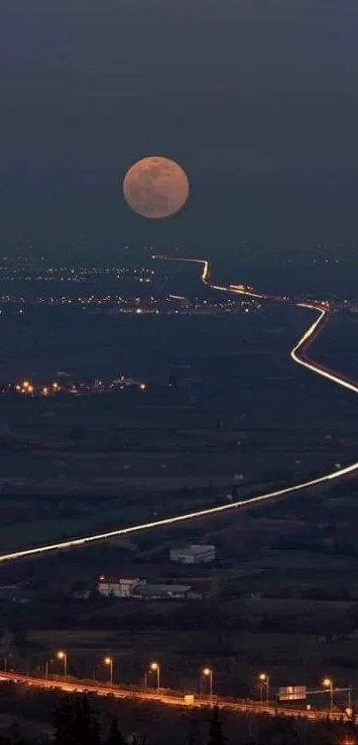 Moonlit highway under a full moon with urban lights