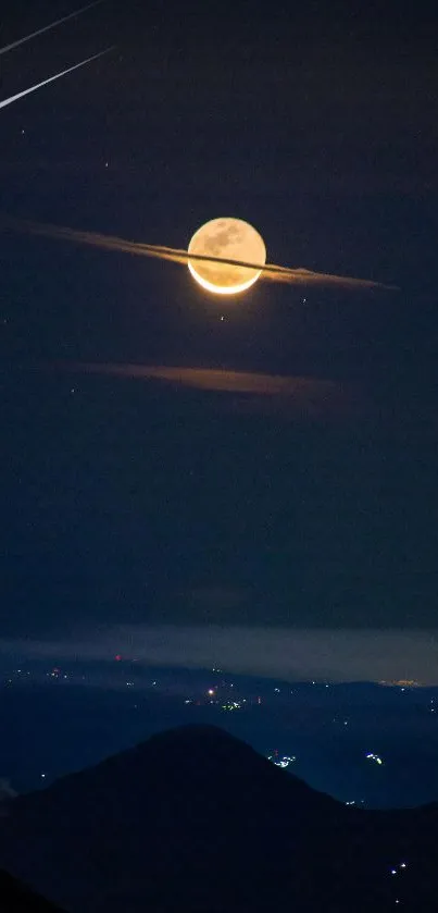 Serene moonlit mountain night with a starry sky and glowing full moon.