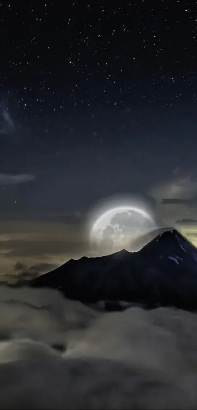 Moonlit mountain under a dark starry night sky.