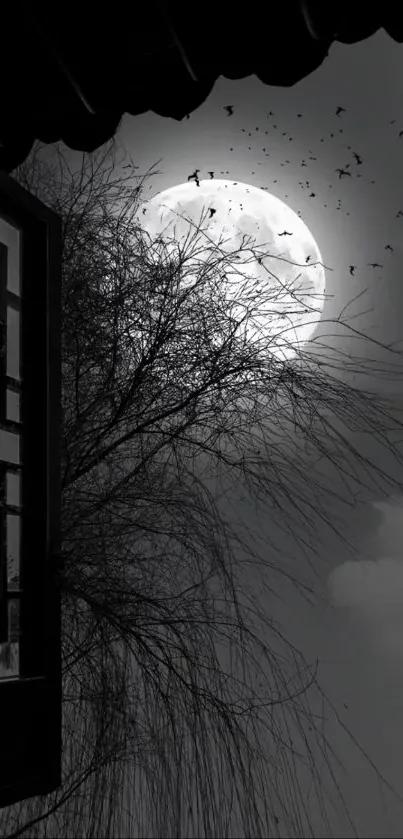 Black and white wallpaper with a full moon, silhouetted branches, and birds.