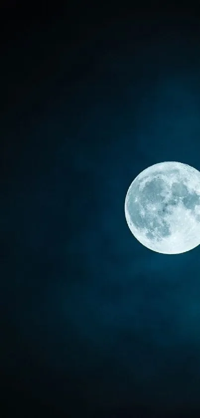 Moonlit night sky with a glowing full moon against a dark blue background.