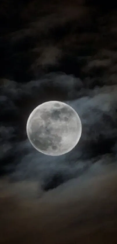 Full moon in a dark, cloudy night sky wallpaper.