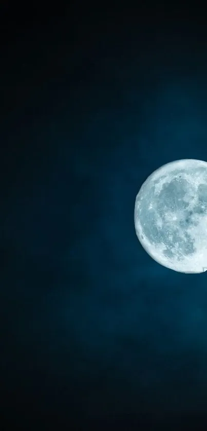 Serene night sky with a bright full moon on a dark blue background.