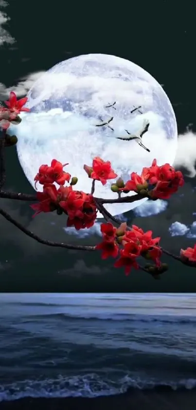 Moonlit night with red blossoms over ocean.