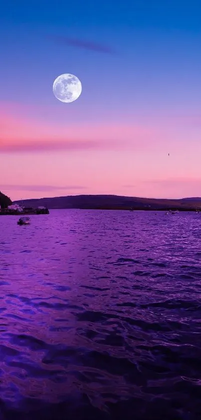 Moonlit ocean under purple sky wallpaper with serene twilight hues.