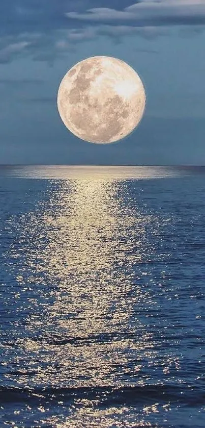 Full moon reflected on calm ocean at night, creating a serene mobile wallpaper.