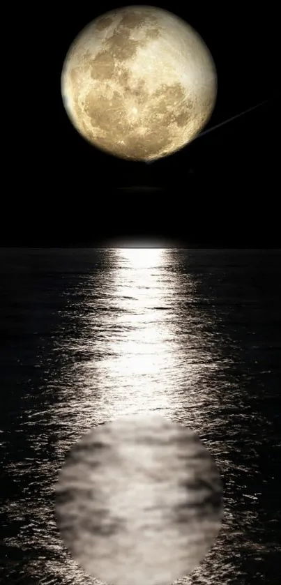 Full moon reflecting on ocean at night.