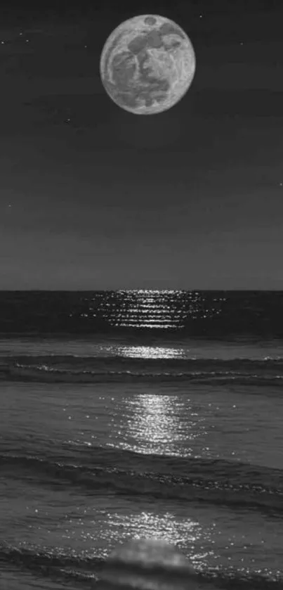 Moonlit ocean night with reflective water and a luminous full moon.