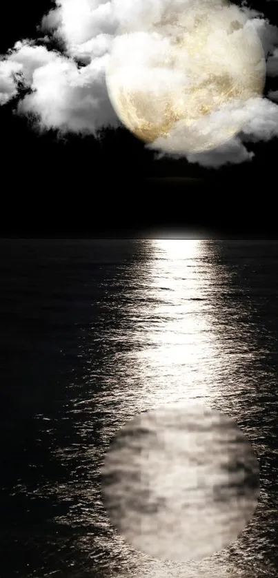 Moonlit ocean reflection with cloudy night sky.